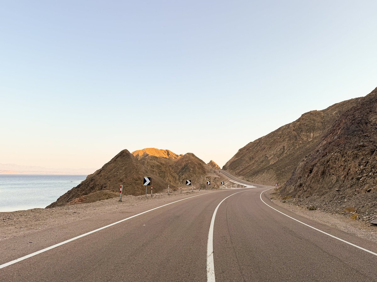 Winding coastal road through desert mountains along Sinai seaside